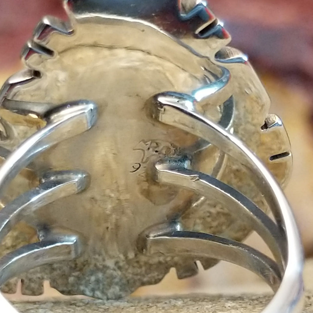 The stamp is found on the underside of the setting.