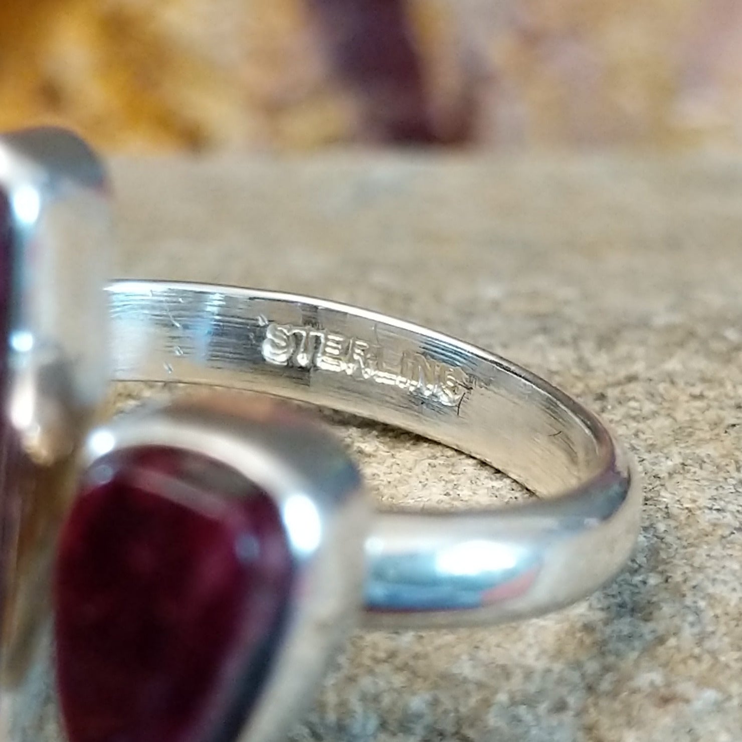 The authentication stamp is on the inside of the band.