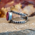 Open, layered sterling silver band with stamping and a purple spiny oyster centerpiece.
