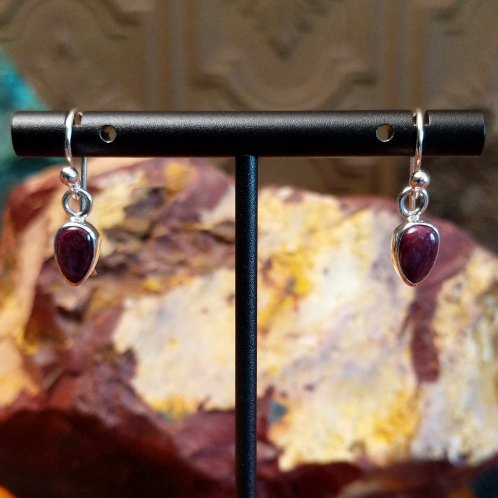 Small purple spiny oyster shell set in sterling silver in the shape of a petal.