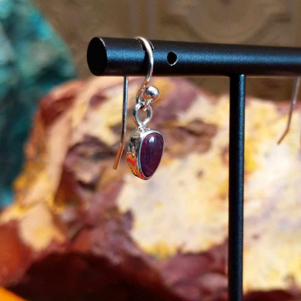 Small purple spiny oyster shell set in sterling silver in the shape of a petal.