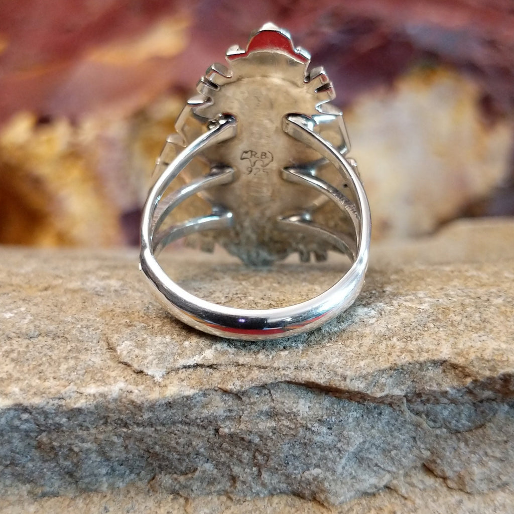 The tapered, layered band of the ring.