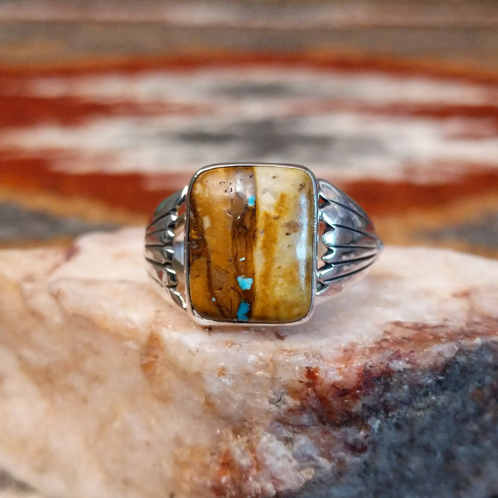 Boulder turquoise set in the bezel of the sterling silver ring.