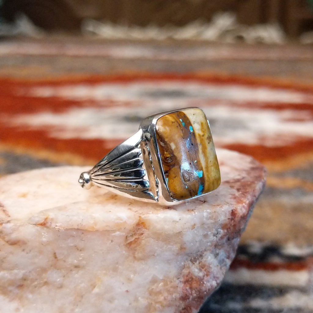 Boulder turquoise set in the bezel of the sterling silver ring.