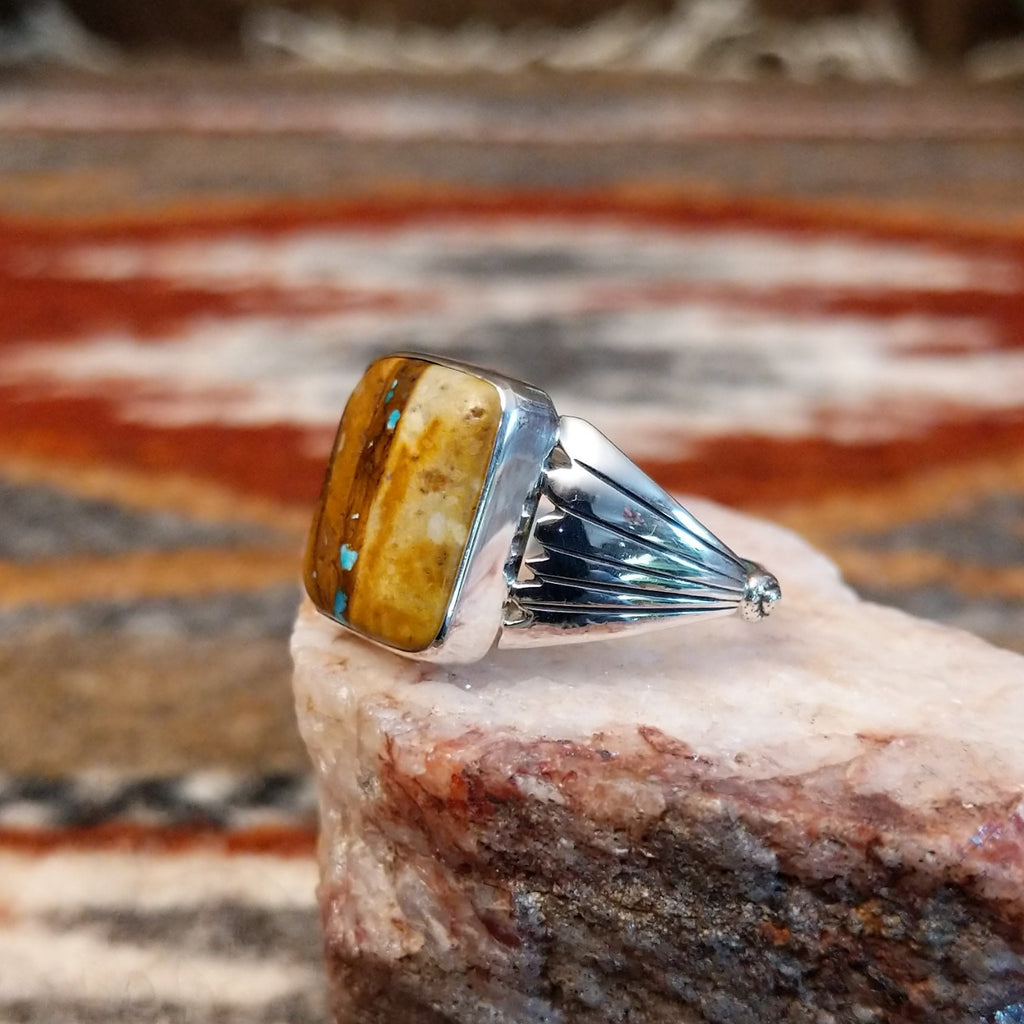 Boulder turquoise set in the bezel of the sterling silver ring.