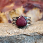 Purple triangular spiny oyster shell set in a silver setting and tri-layered band.
