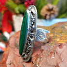 Tufa cast sterling silver ring with large malachite stone set in the bezel.