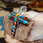 Sterling silver dragonfly pendant with multistone inlay.