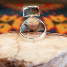 Sterling silver ring with multi-stone inlays set in the geometric bezels.