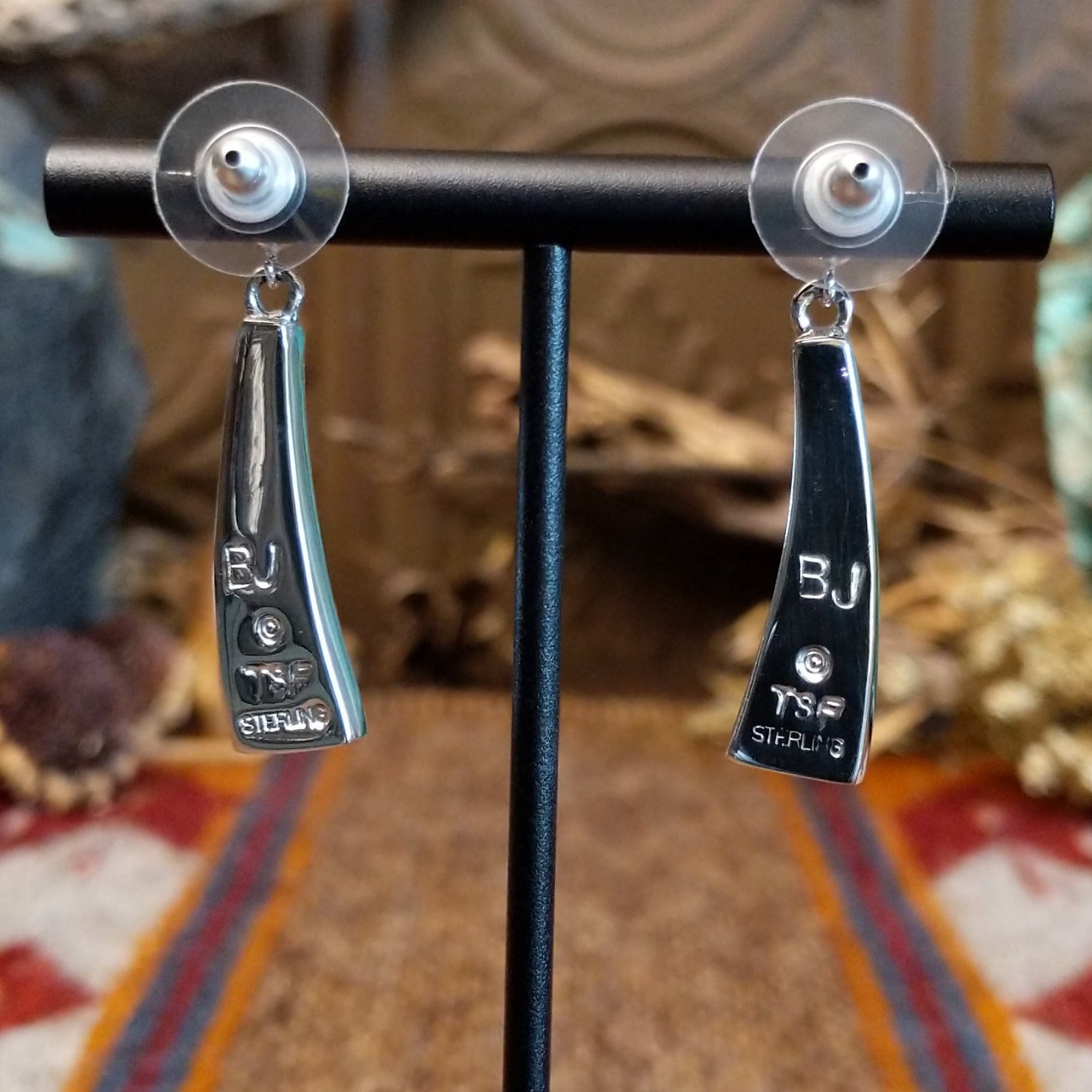 Close-up of the artisan's stamped siganture.