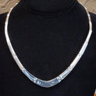 The back of the necklace showcases the link chain and polished sterling silver.