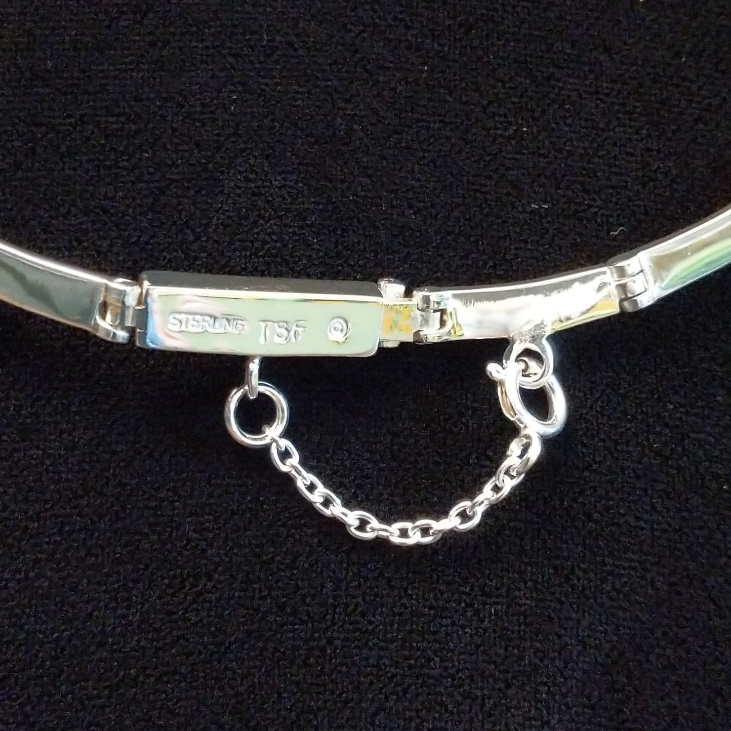Close-up of the necklace clasp.
