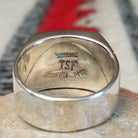 Navajo Multistone Inlay Ring by A.M.P. featuring a square geometric mosaic of turquoise, blue, purple, orange, red, and iridescent inlay set in a wide polished silver band; artisan and Sterling Silver stamp.
