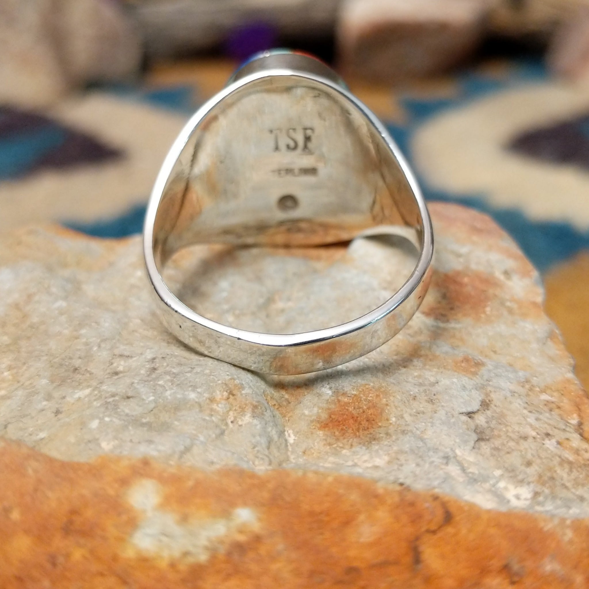Sterling silver Navajo multistone inlay ring by P.D. featuring turquoise, red and orange spiny oyster shell, lapis, and geometric Southwestern inlay design; underside view.