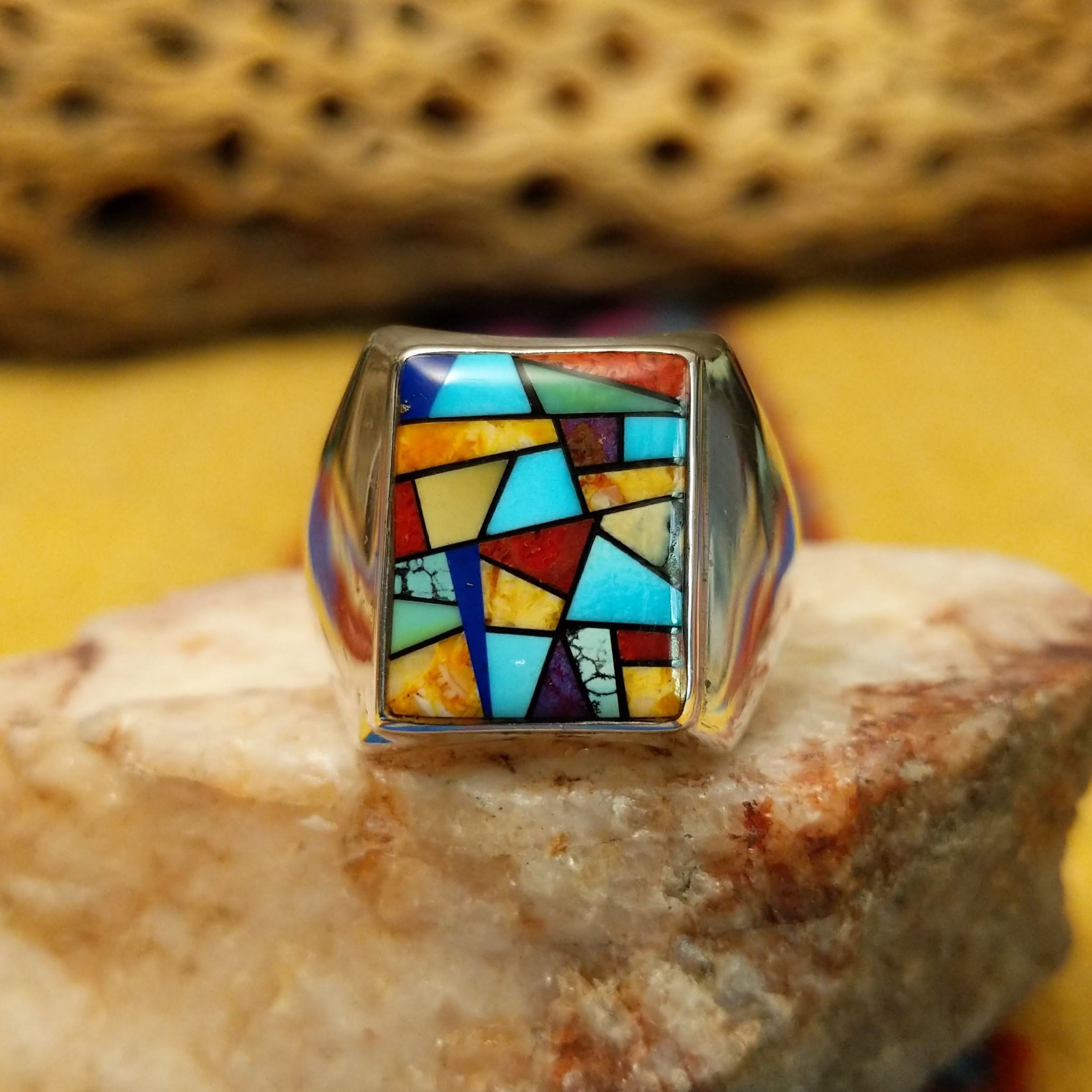 Navajo multistone mosaic ring, featuring a colorful mosaic of natural stones set in a handcrafted sterling silver band with traditional Southwestern-inspired craftsmanship.