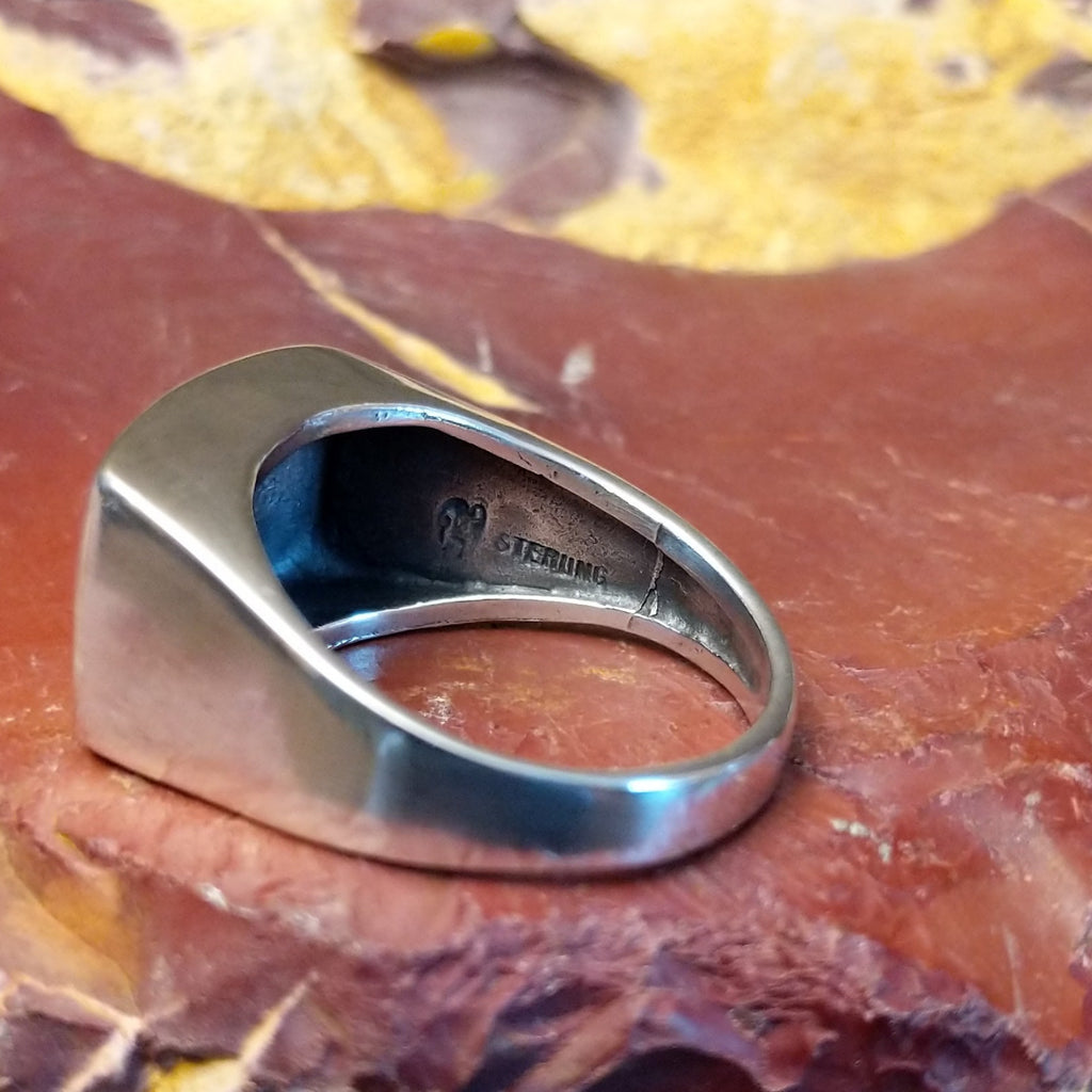 The stamp is found on the interior of the ring.