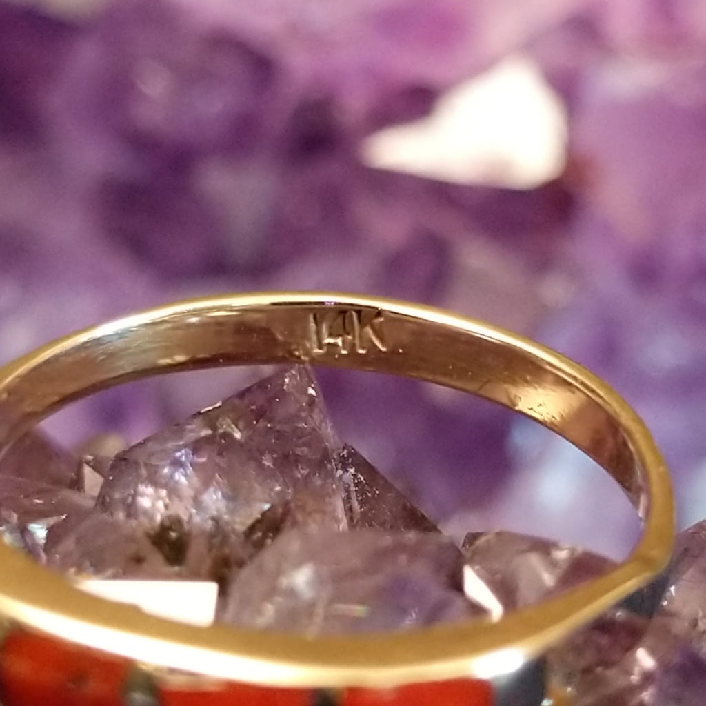 The authetic 14k stamp etched into the inside of the polished gold band.