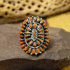 Navajo red spiny oyster shell concho ring, featuring a vibrant red spiny oyster shell set in a handcrafted sterling silver concho-style band with traditional Southwestern details.