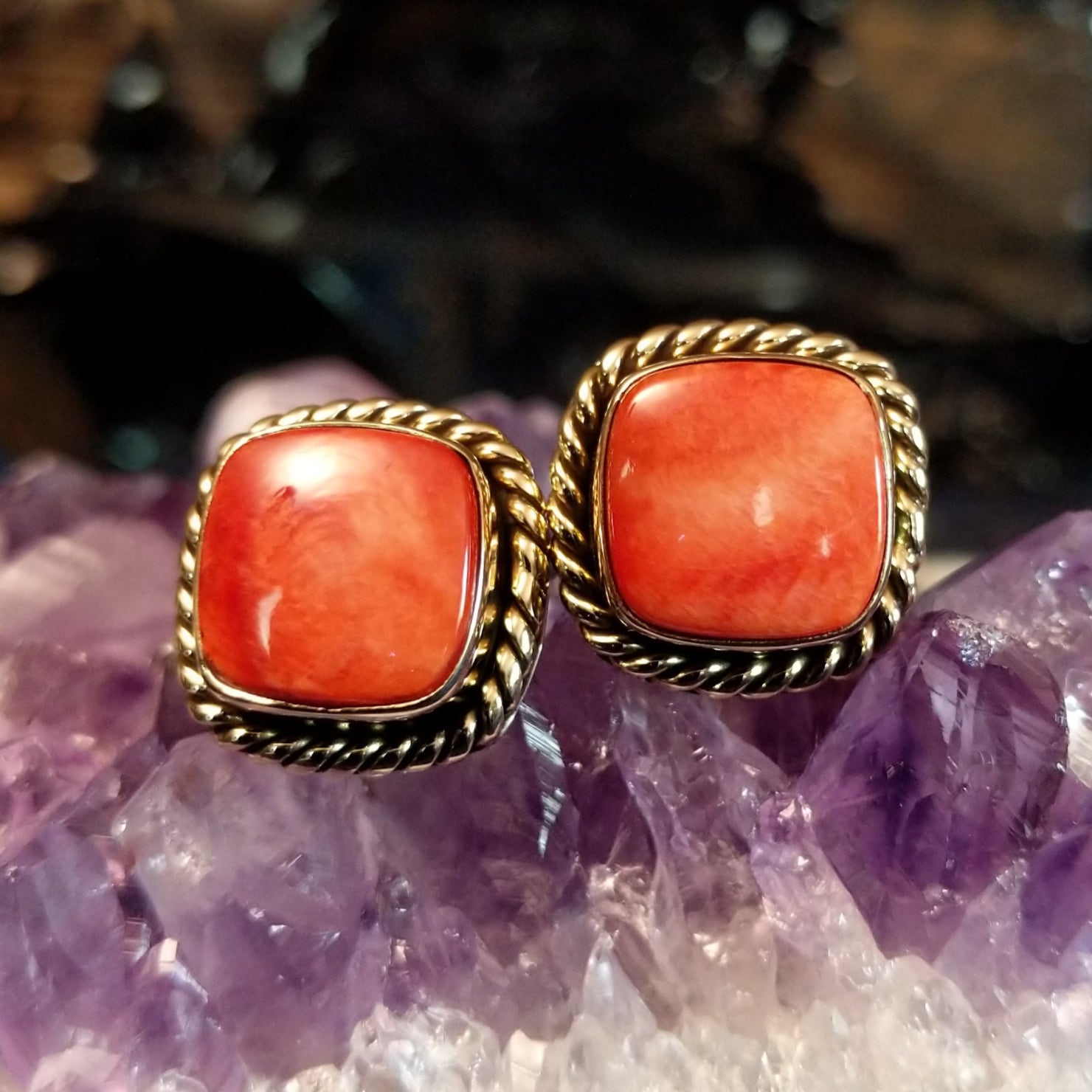 Square red spiny oyster shell earrings with twisted rope silver and gold borders.