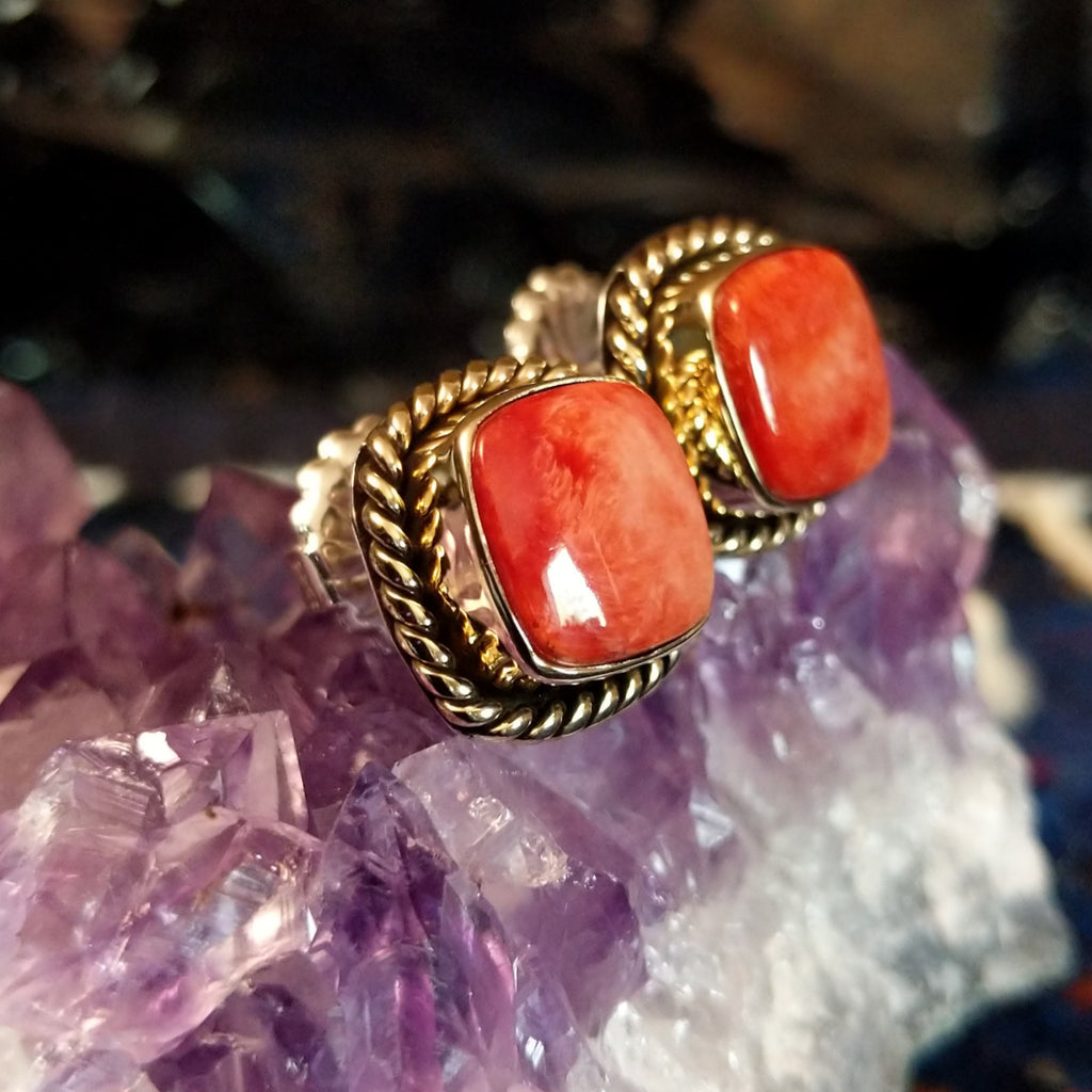 Square red spiny oyster shell earrings with twisted rope silver and gold borders.