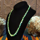 Rough cut Sonoran Gold turquoise beaded along the sterling silver chain of the necklace.
