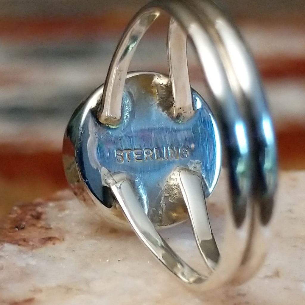 Sterling silver authentication stamp.