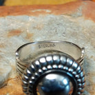 Authentic Navajo sterling silver dome ring with polished curved design. Features elegant silhouette suitable for everyday wear or special occasions. Size 8.5, measures approximately 0.75" L x 0.875" W, weighs approximately 0.2 oz; Sterling Silver.