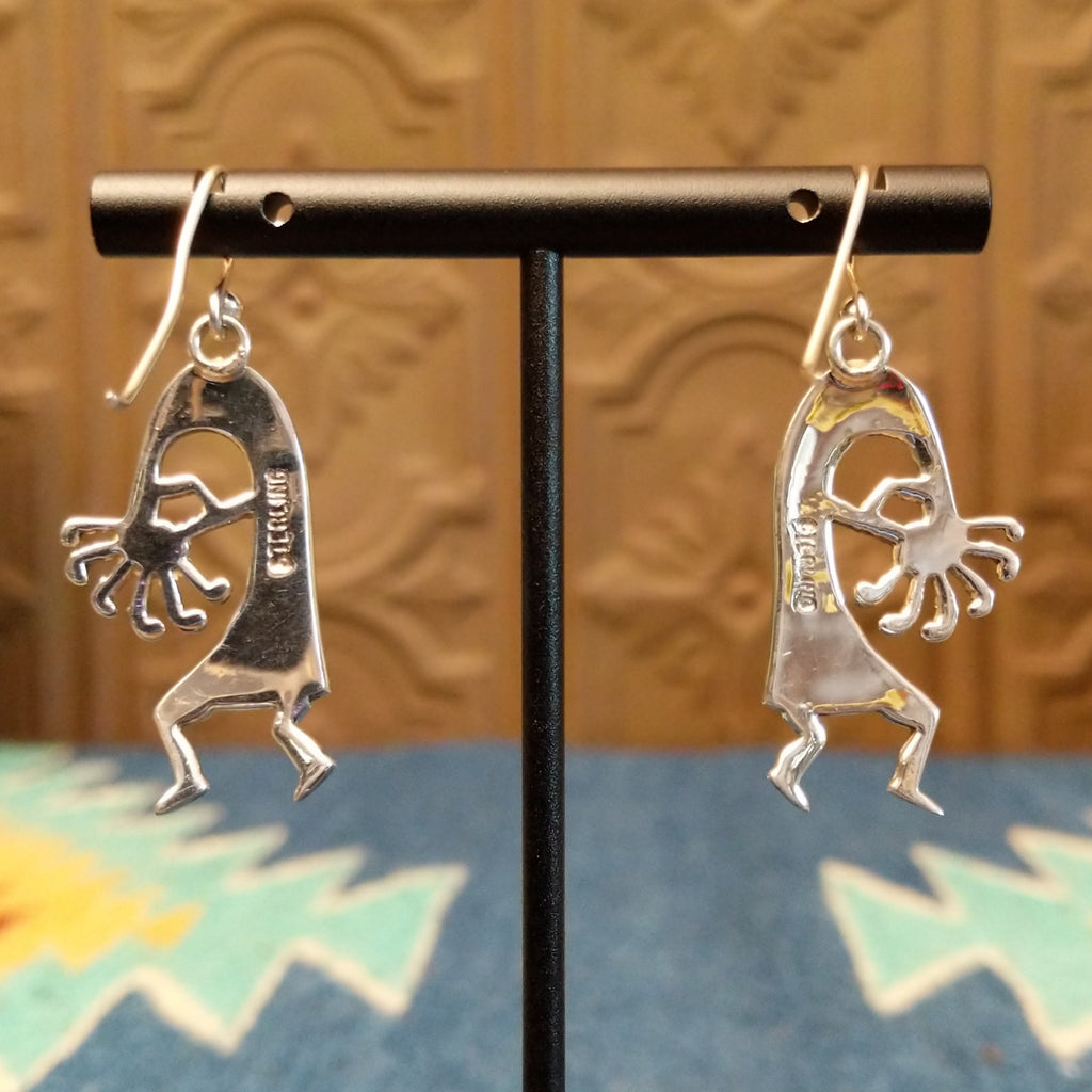 The back of the earrings feature the stamp.