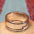 Close up of the artist's stamped signature