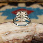 Navajo silver Sunface ring, featuring a handcrafted sterling silver Sunface design with intricate detailing and traditional Southwestern craftsmanship.  Underside view.