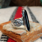 Navajo silver ring with long black onyx and detailed silver band.