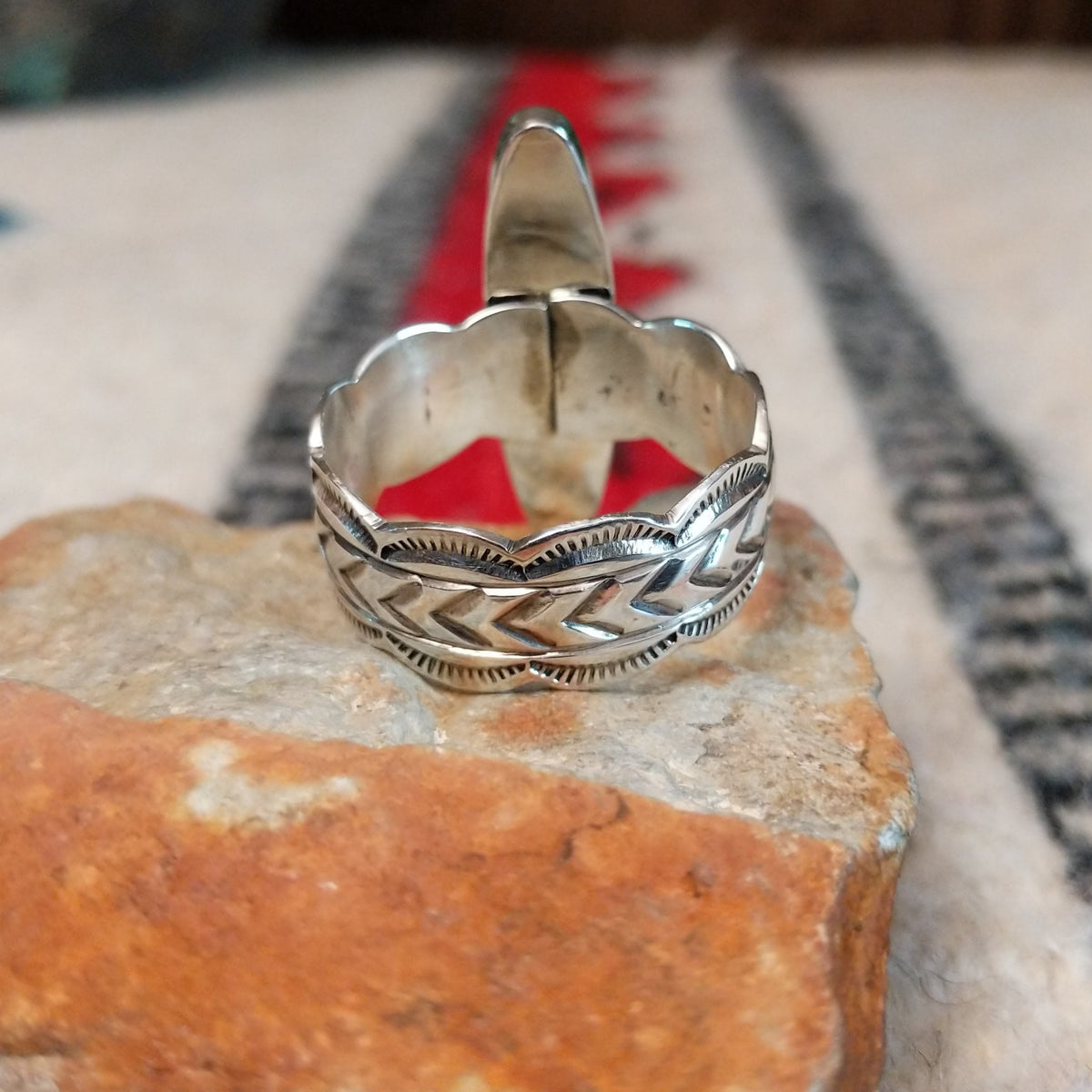 Navajo silver ring with long black onyx and detailed silver band.