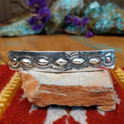 Sterling silver Navajo slim barrette with stamped oval silverwork design.