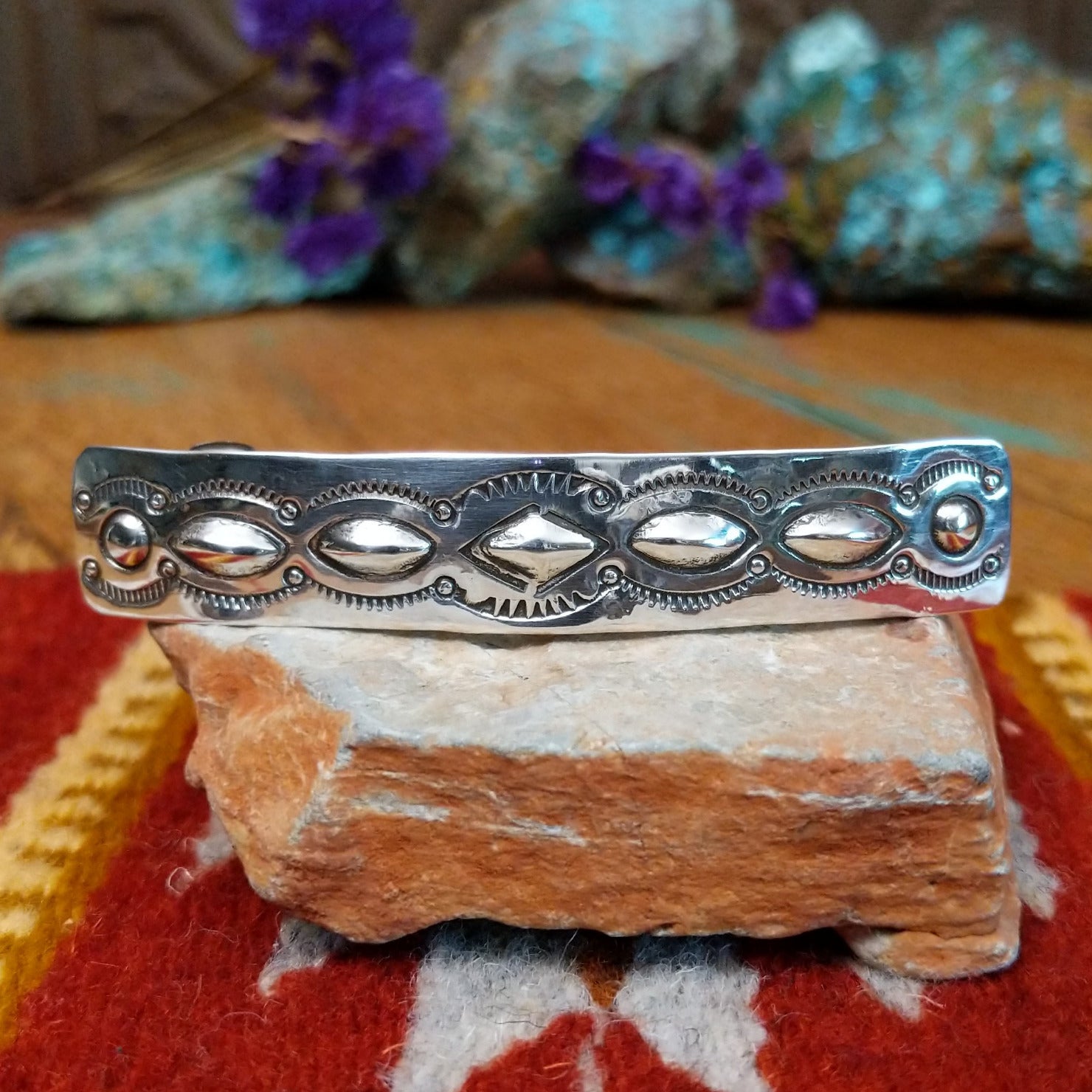Sterling silver Navajo slim barrette with stamped oval silverwork design.