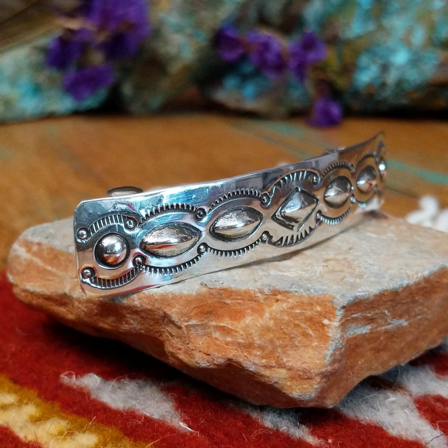 Sterling silver Navajo slim barrette with stamped oval silverwork design.