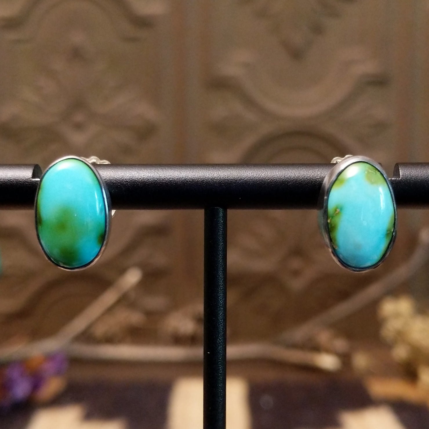 Sterling silver earrings with Sonoran gold turquoise set in oval bezels.