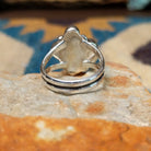 Handcrafted sterling silver Navajo Sonoran Gold turquoise and orange spiny oyster ring, featuring a colorful asymmetrical cluster design; underside view.
