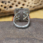 Navajo square black onyx ring, featuring a polished square black onyx stone set in handcrafted sterling silver with traditional Southwestern-inspired metalwork.  Underside view.