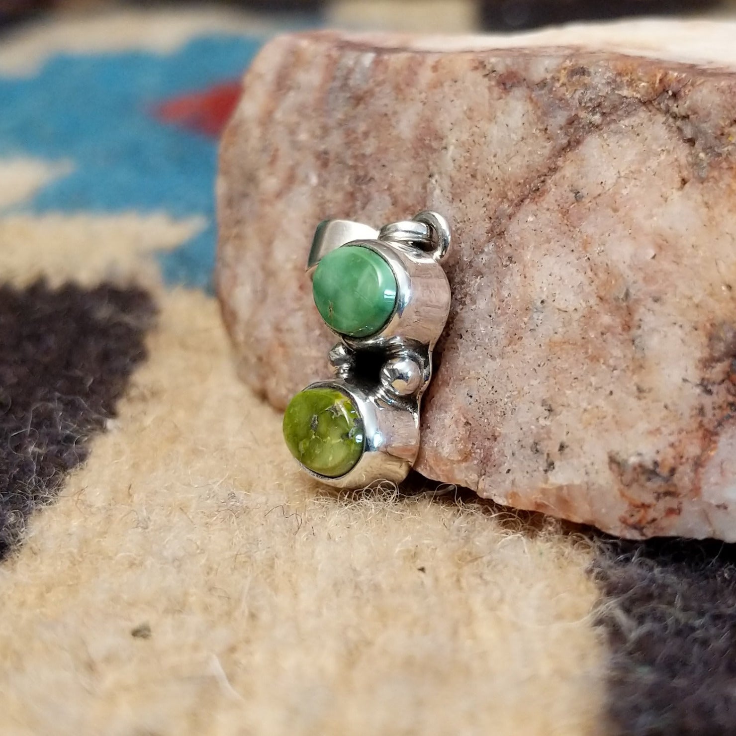 Sterling silver pendant with Sonoran gold turquoise set in the stacked bezel.