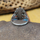 Navajo Starry malachite ring, featuring a vibrant green malachite stone with natural banding set in a handcrafted sterling silver band with Southwestern-inspired metalwork.  Underside view.