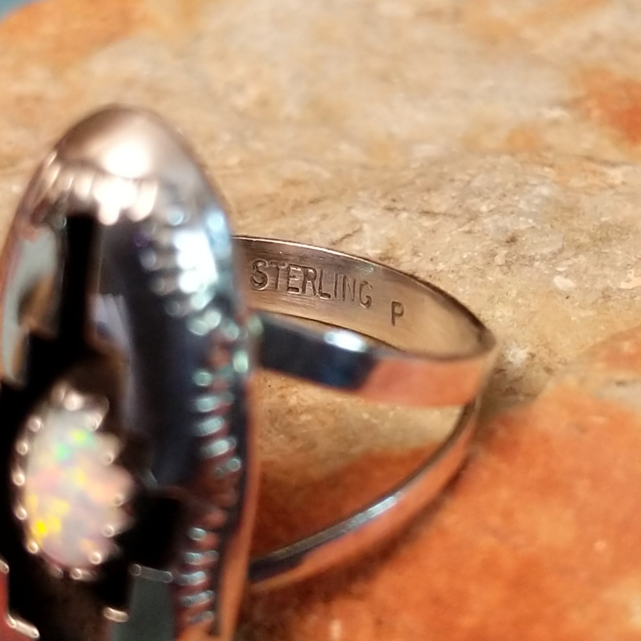 Close up of the artist's stamped signature