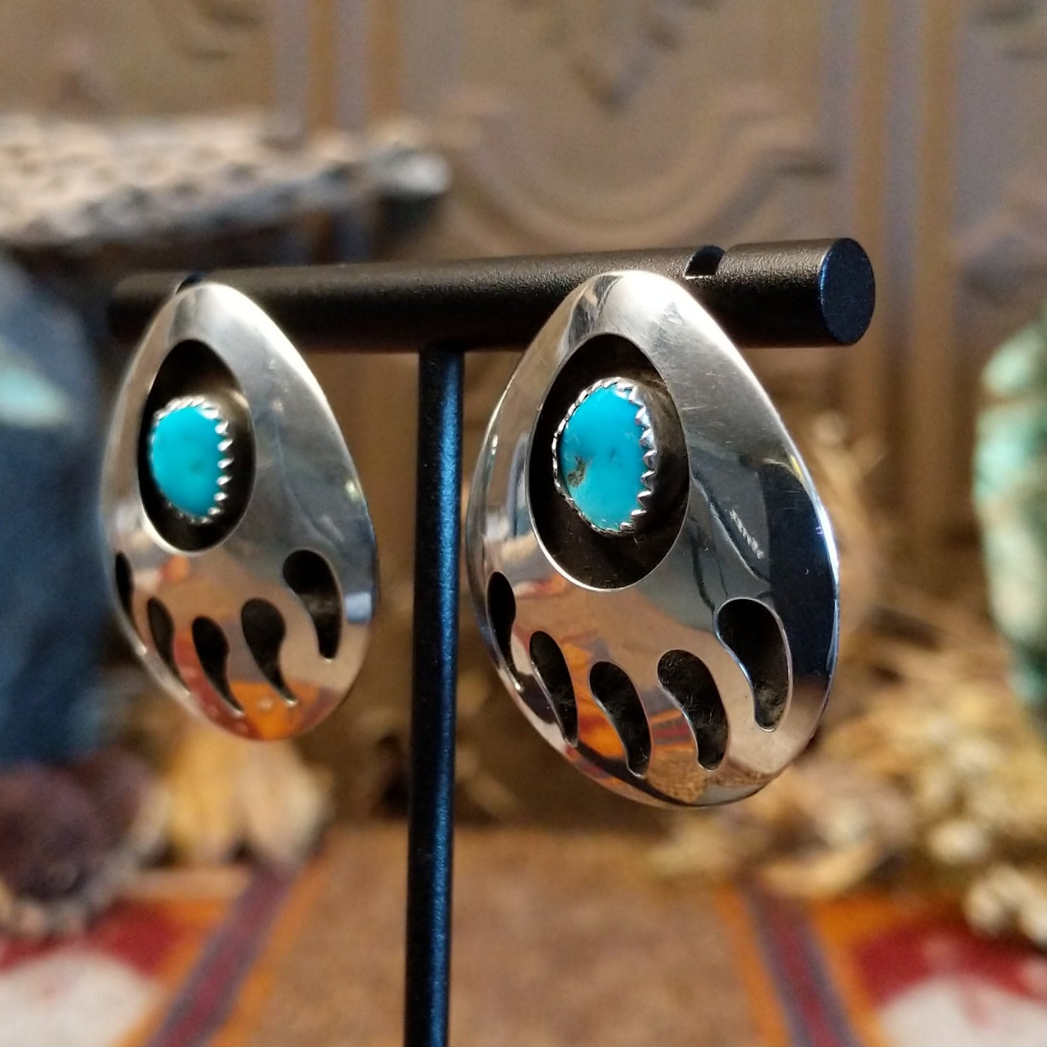 Sterling silver shadowbox earrings with turquoise set in notched bezels.