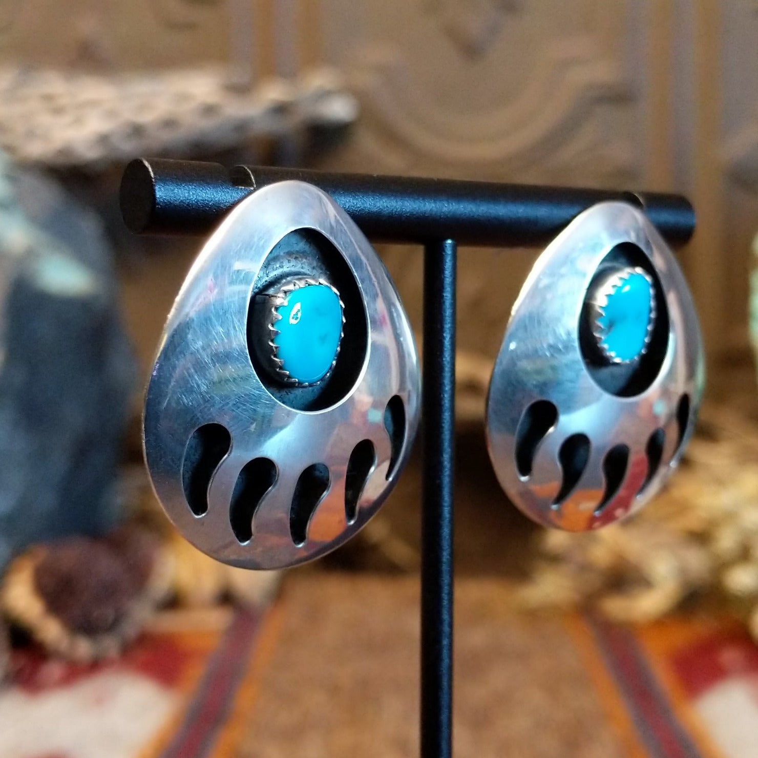Sterling silver shadowbox earrings with turquoise set in notched bezels.