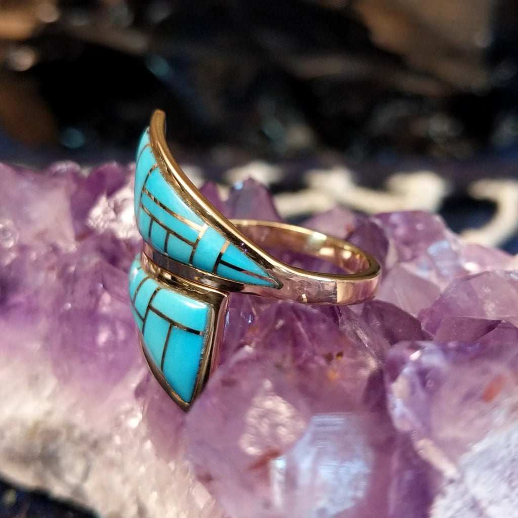 Side angle highlighting the split bandand raised turquoise mosaic inlays.