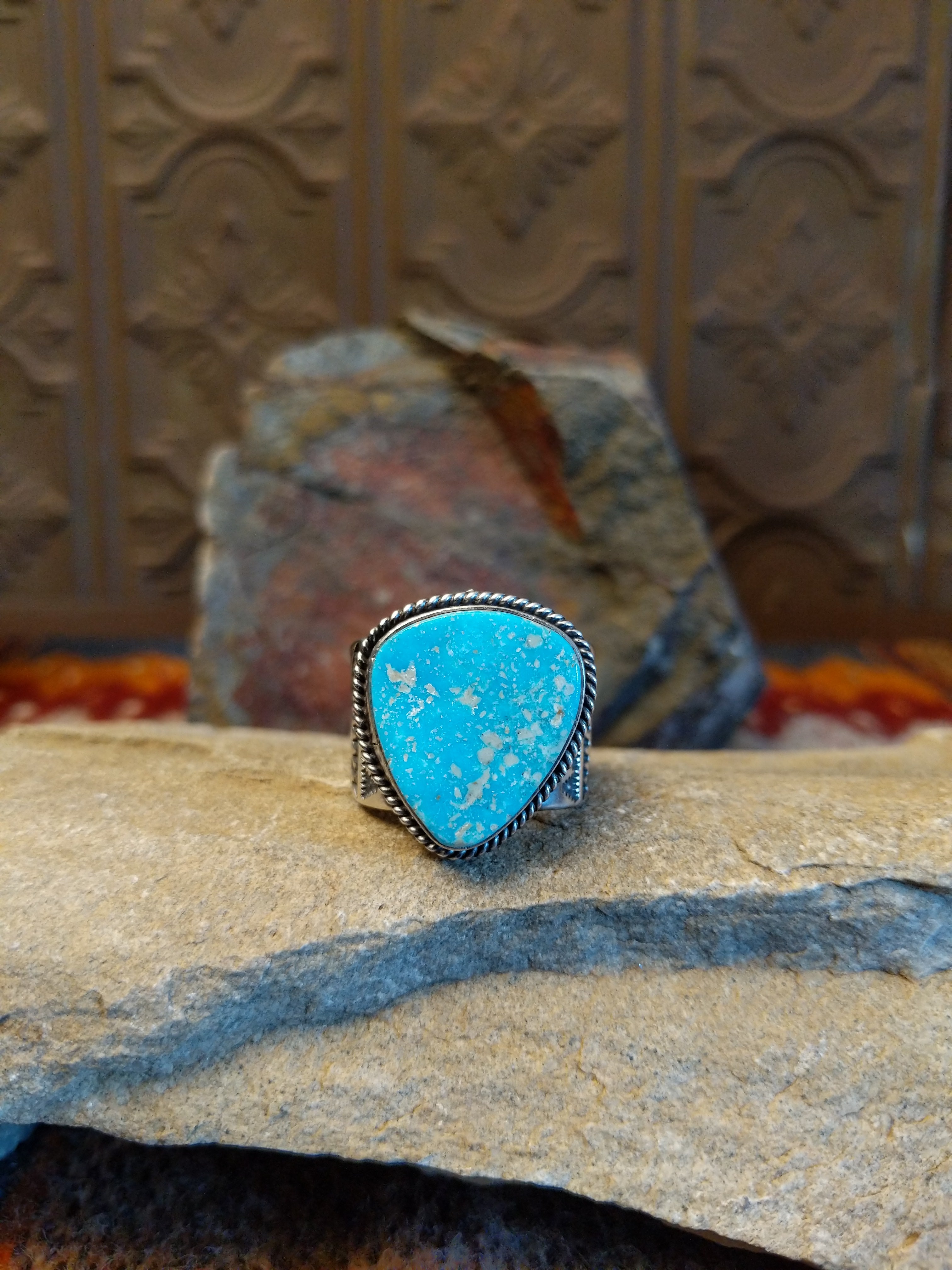 Navajo triangular turquoise ring by L.P., handcrafted in sterling silver; size 14
