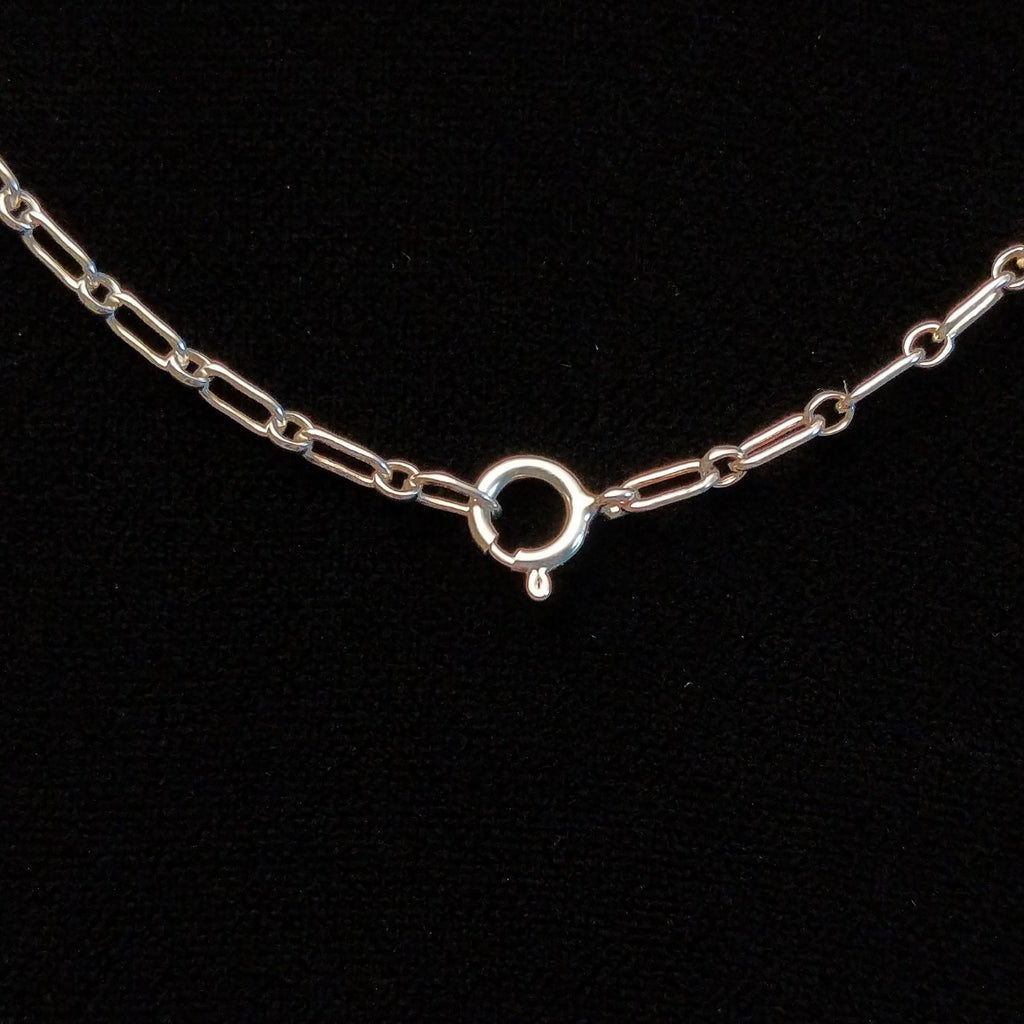Close-up of the sterling silver clasp.