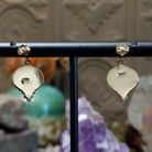 Close up of earring backing and stamped 14K indicating 14 karat gold construction.