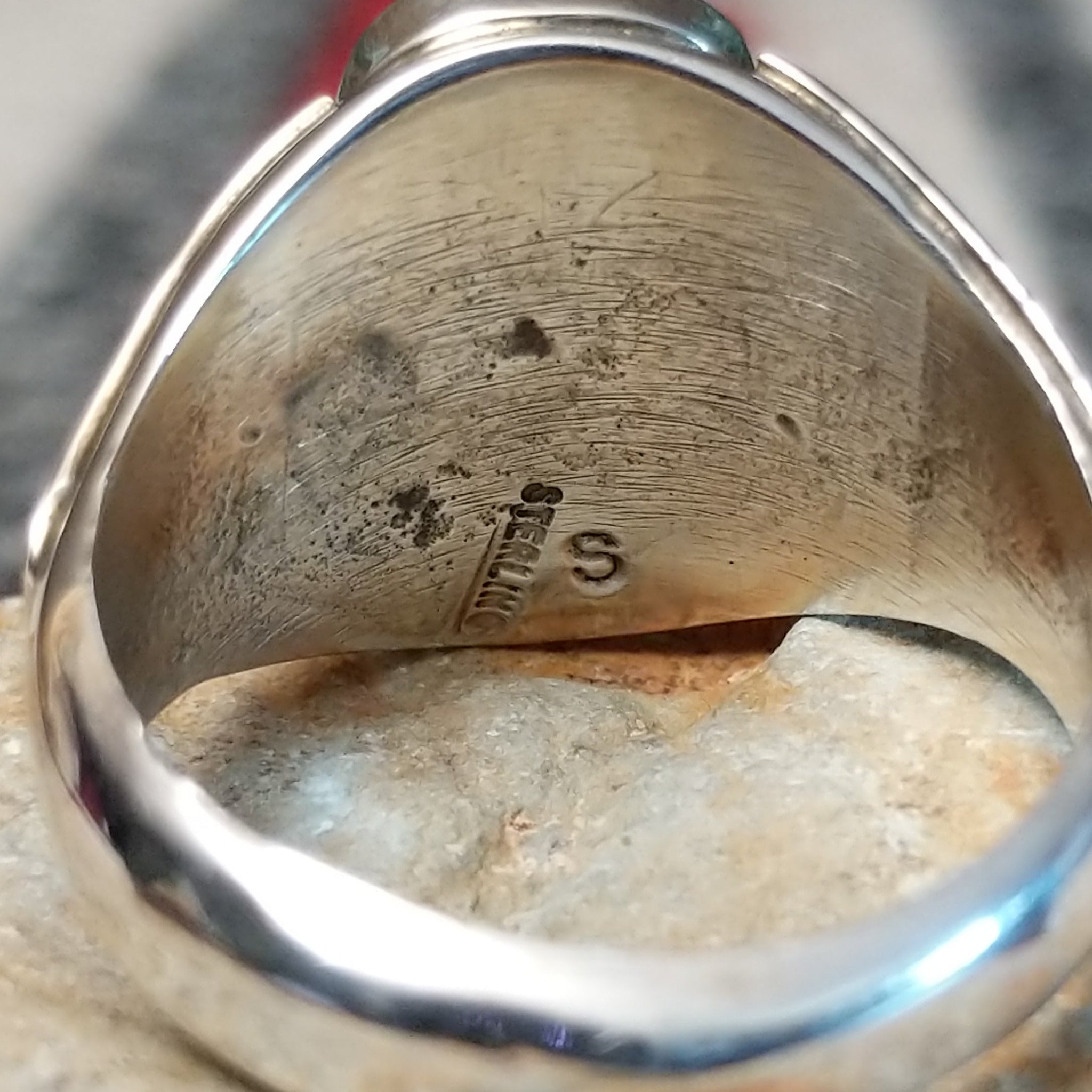 Navajo Turquoise Duo Ring by S. featuring two bright blue turquoise stones with dark matrix, silver bead accents, and a wide detailed silver band; artisan and Sterling Silver stamp.