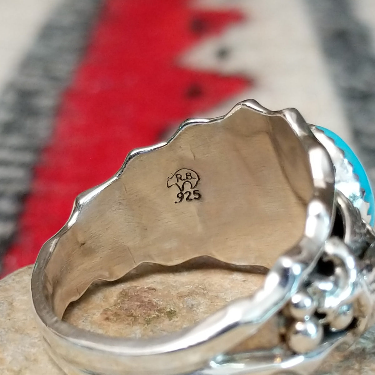 Close up of the artist's stamped signature