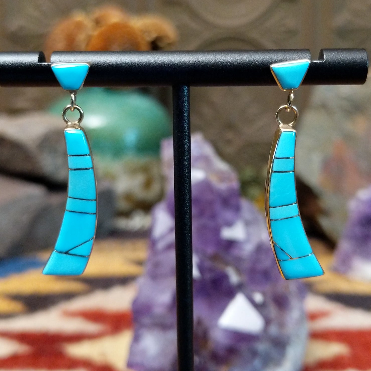 14kt gold Navajo dangle earrings with curved turquoise inlay panels.
